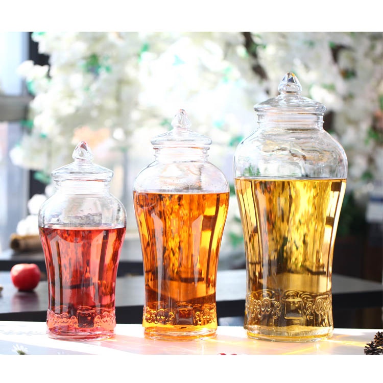 Wholesale Large Embossing Ginseng Fruit Wine Glass Bottle Seal Glass Storage Jars With Tap