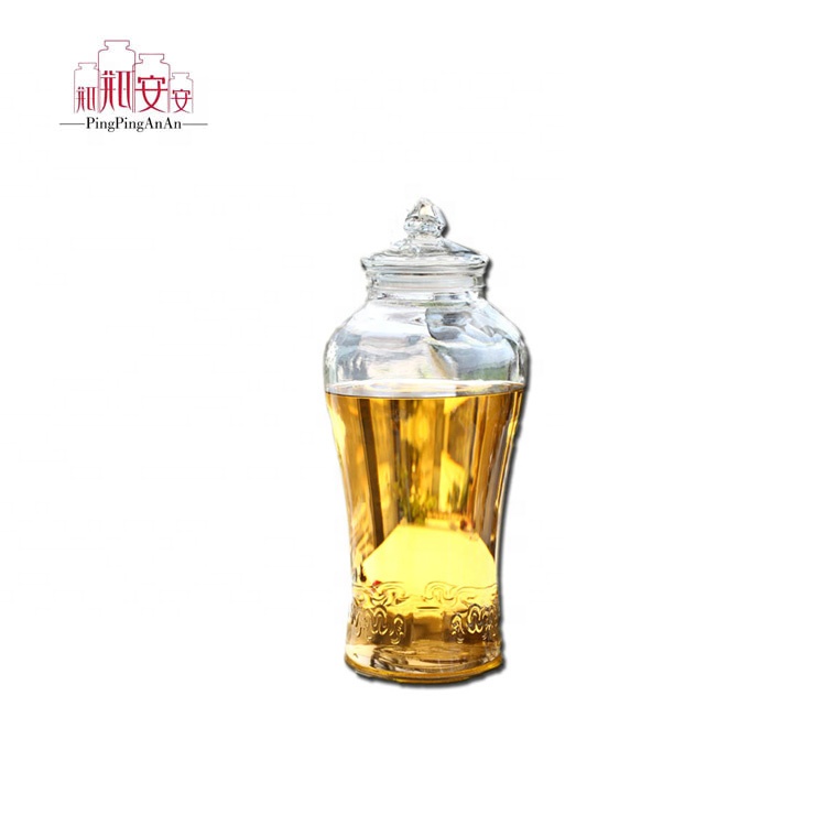 Wholesale Large Embossing Ginseng Fruit Wine Glass Bottle Seal Glass Storage Jars With Tap