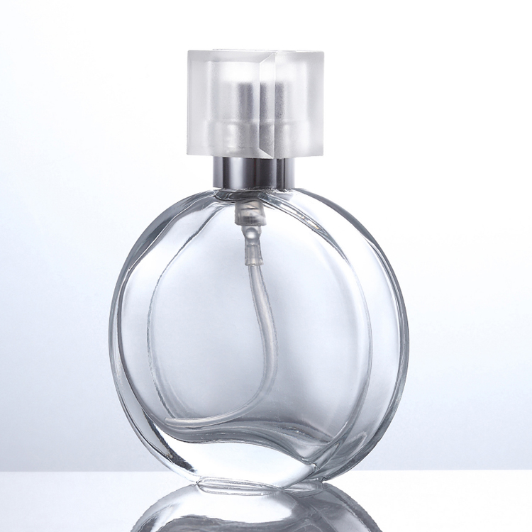 Wholesale Luxury 30ml 50ml Clear Empty Round Shaped Glass Spray Perfume Bottle With Screw Lid
