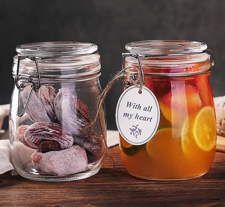 Wholesale Luxury 500ml 750ml Round Sealed Clear Glass Bottles For Honey Packing Food Safe