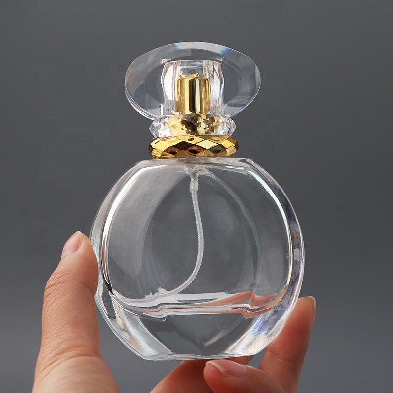 Wholesale Luxury Round Women Fragrance Glass Spray Empty 50ml Perfume Bottles