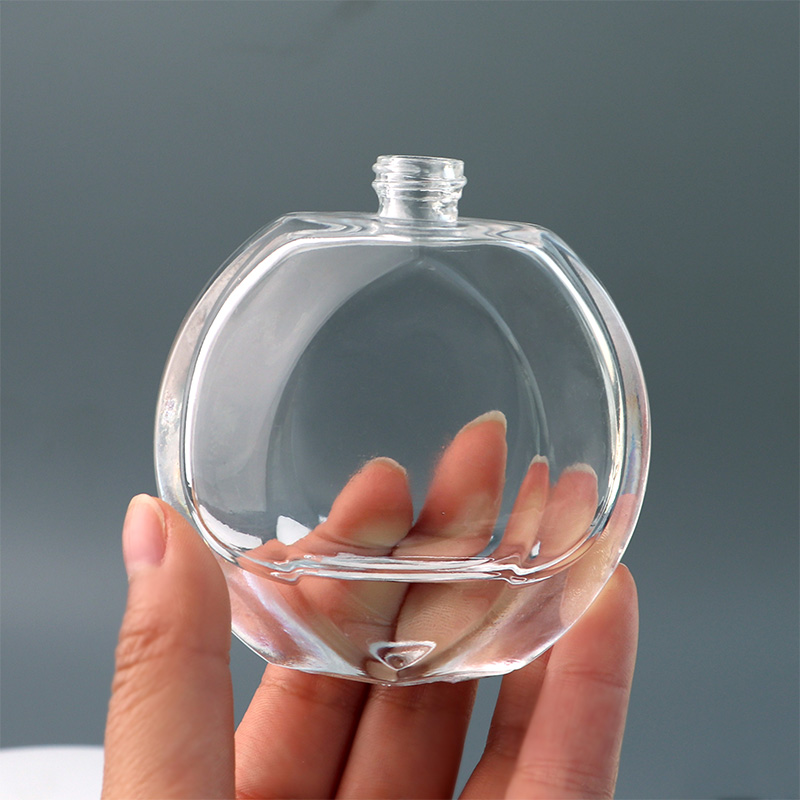 Wholesale Luxury Round Women Fragrance Glass Spray Empty 50ml Perfume Bottles