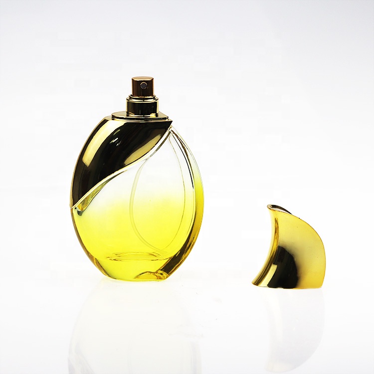 Wholesale Luxury Round Yellow Perfume Spray Bottle 100ml With Gold Cap