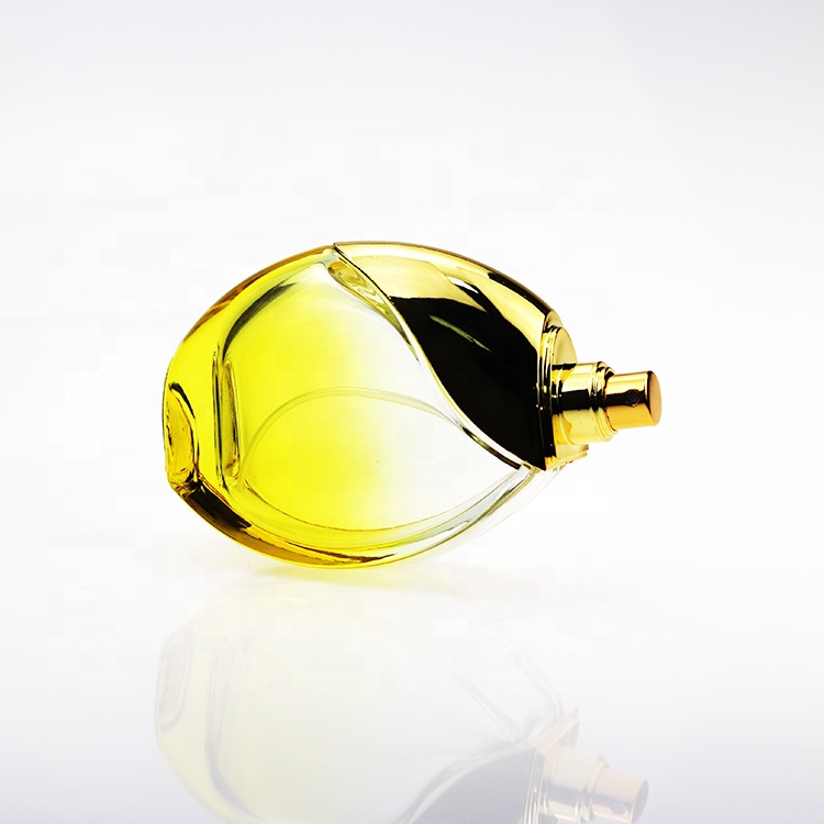 Wholesale Luxury Round Yellow Perfume Spray Bottle 100ml With Gold Cap