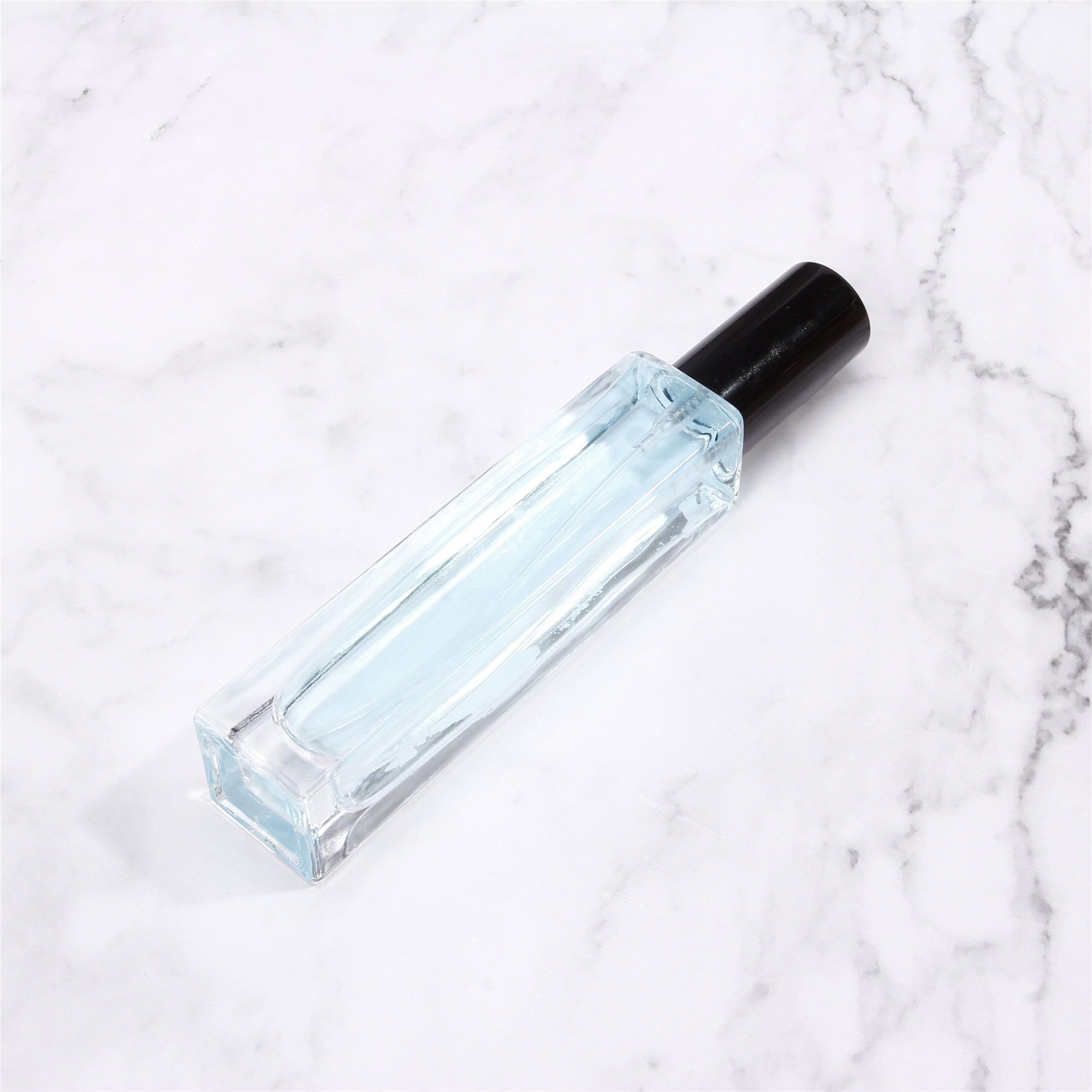 Wholesale Manufacturer 30ml 50ml 100ml Empty Clear Square refillable Glass Spray Perfume Bottle