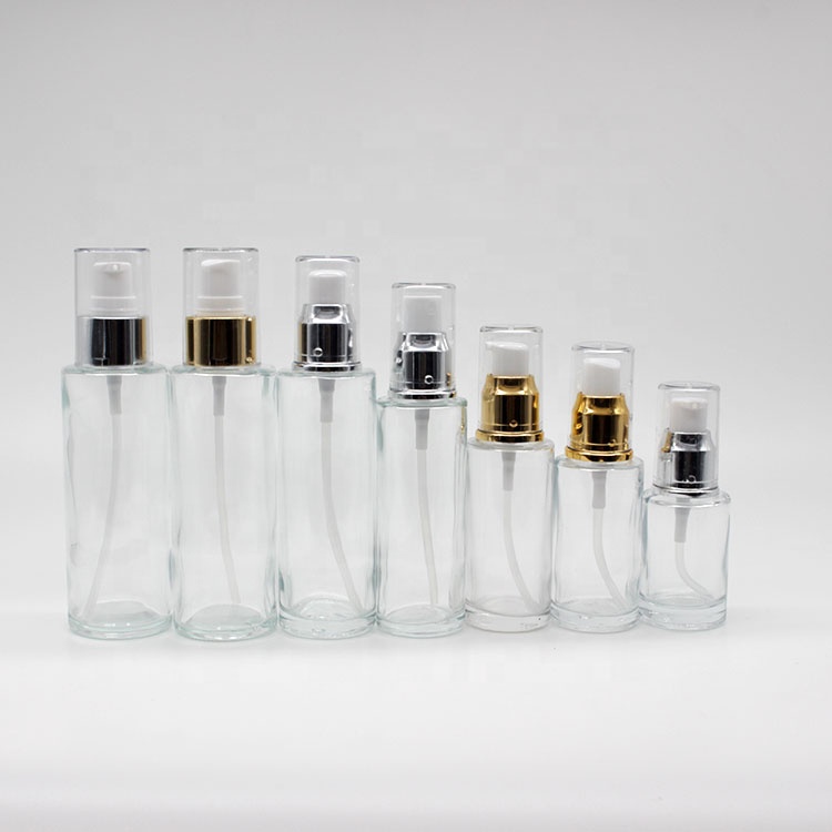 Wholesale Mini Cylinder Cosmetic Transparent Spray Packaging Bottles Empty Skin Care Serum Lotion Pump Bottles with Pump