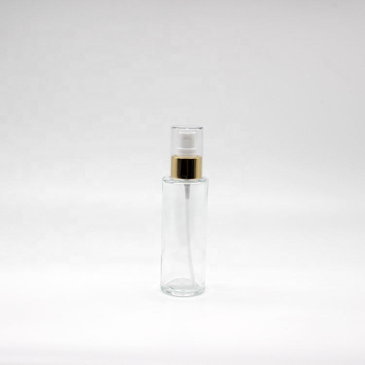 Wholesale Mini Cylinder Cosmetic Transparent Spray Packaging Bottles Empty Skin Care Serum Lotion Pump Bottles with Pump