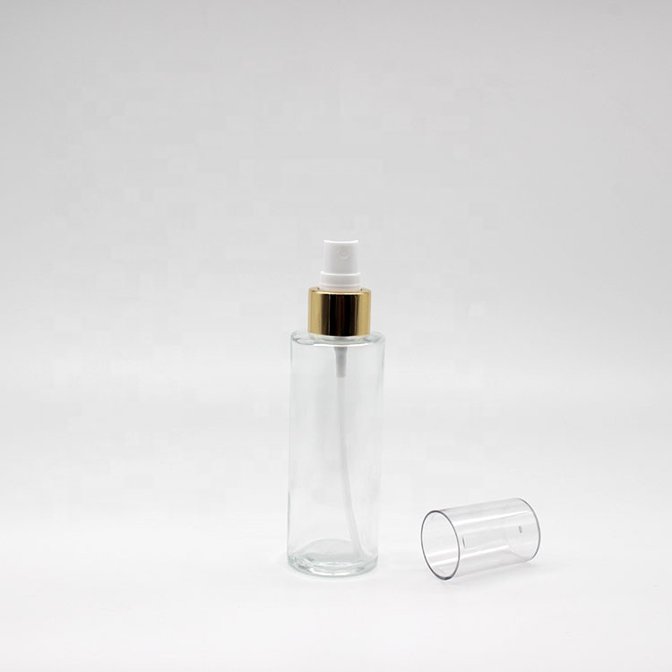 Wholesale Mini Cylinder Cosmetic Transparent Spray Packaging Bottles Empty Skin Care Serum Lotion Pump Bottles with Pump