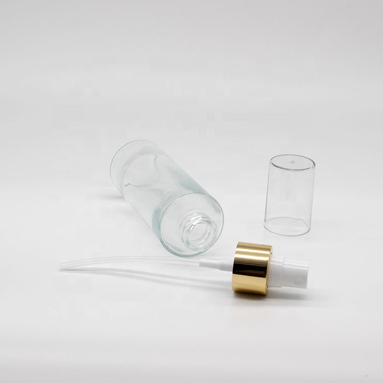 Wholesale Mini Cylinder Cosmetic Transparent Spray Packaging Bottles Empty Skin Care Serum Lotion Pump Bottles with Pump