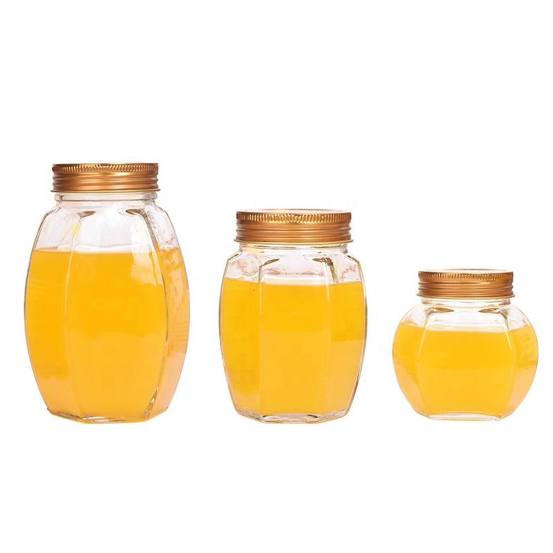 Wholesale New products Unique antique clear empty glass jar bottle jam hexagon honey jar with gold lid