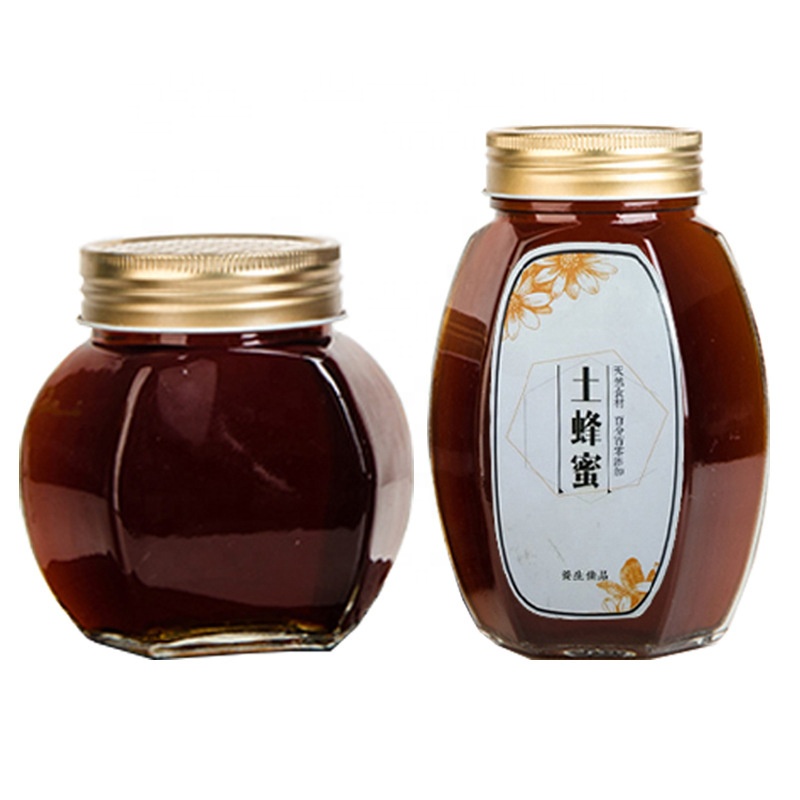 Wholesale New products Unique antique clear empty glass jar bottle jam hexagon honey jar with gold lid