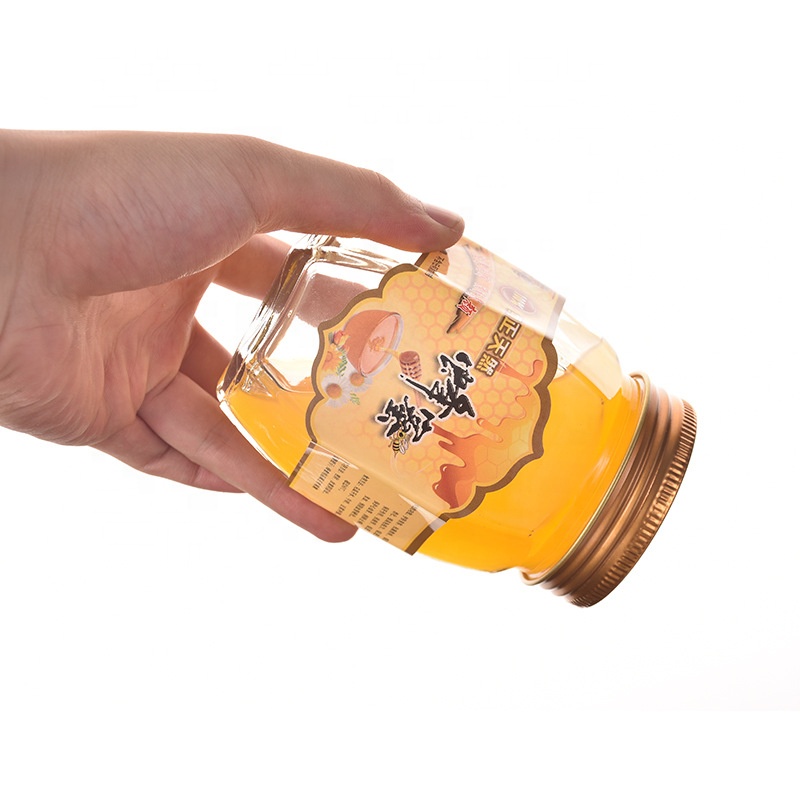 Wholesale New products Unique antique clear empty glass jar bottle jam hexagon honey jar with gold lid