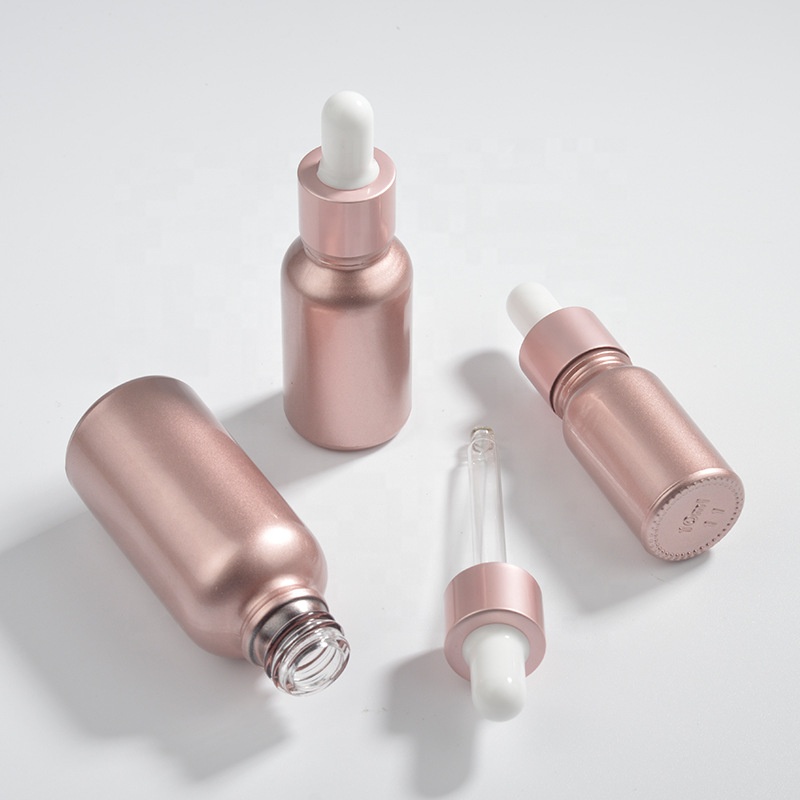 Wholesale OEM Cosmetic Rose Gold Empty Pink Glass Bottles 10ml 15ml 30ml Face Serum Essential Oil Glass Dropper Bottle