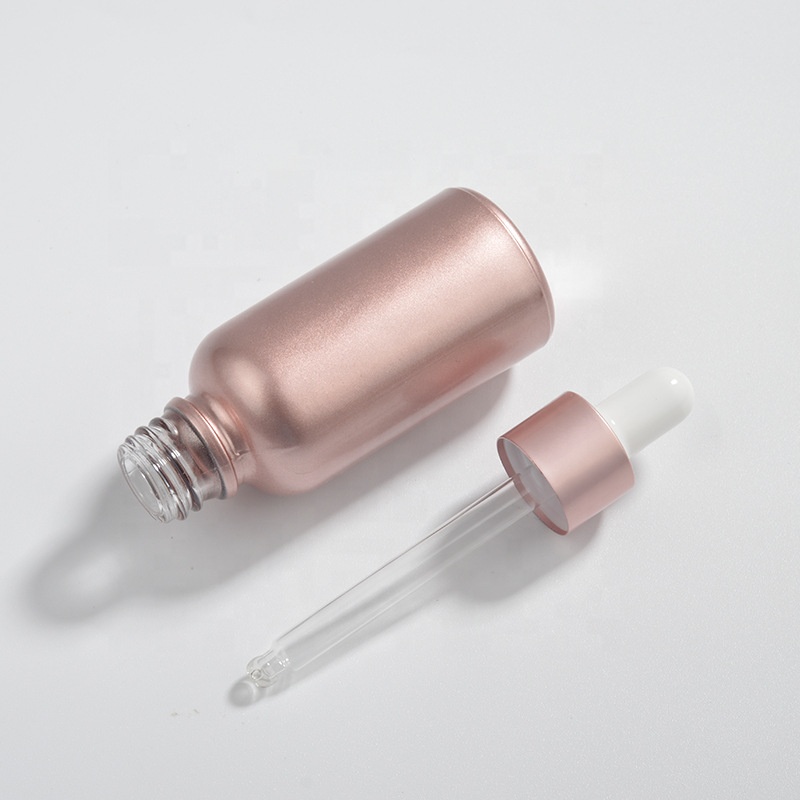 Wholesale OEM Cosmetic Rose Gold Empty Pink Glass Bottles 10ml 15ml 30ml Face Serum Essential Oil Glass Dropper Bottle