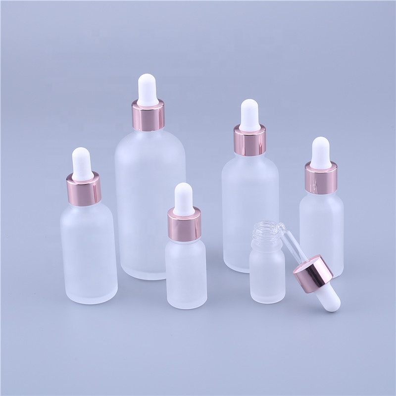 Wholesale OEM Cosmetic Rose Gold Empty Pink Glass Bottles 10ml 15ml 30ml Face Serum Essential Oil Glass Dropper Bottle