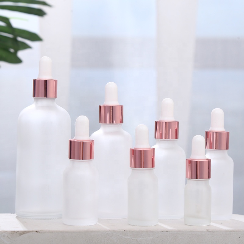 Wholesale OEM Cosmetics Beauty Rose Gold Lid Empty Glass Bottles 30ml 50ml 100ml Face Serum Oil Frosted Glass Dropper Bottle