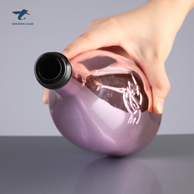 Wholesale Personalized Pink Empty Champagne Glass Bottle With Polymer Cap