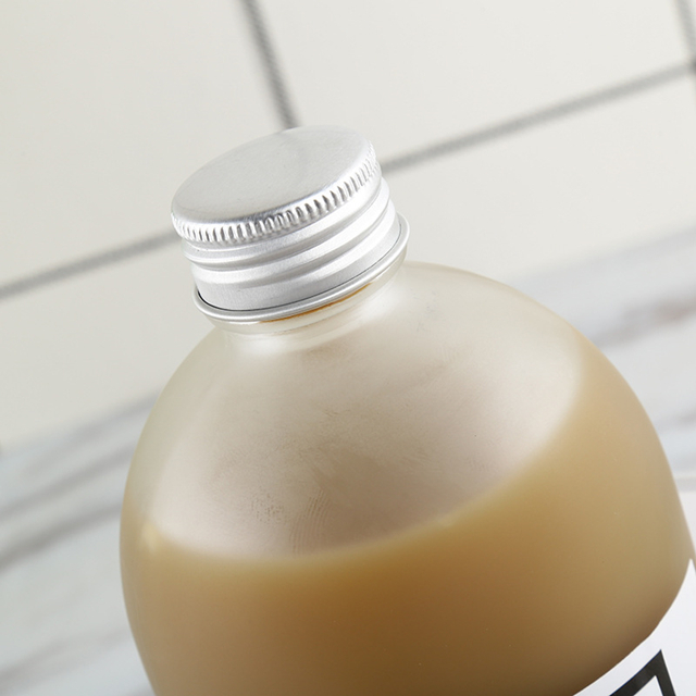 Wholesale Price Round Drinking Tea Bottle 270ml 350ml 500ml Beverage Bottle Glass With Aluminum Cap