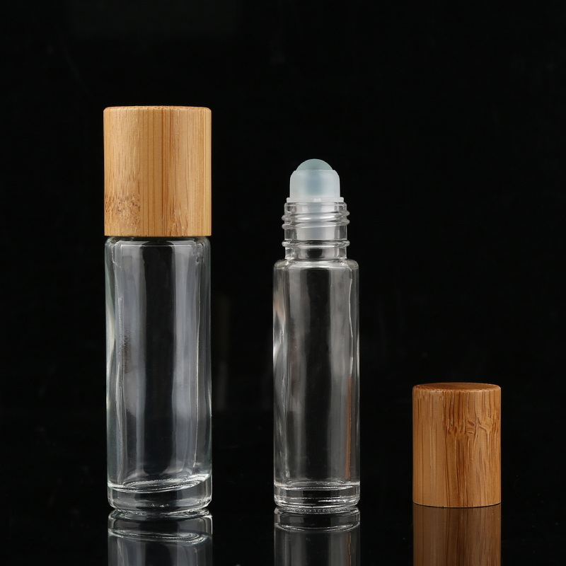 Wholesale Roller Ball Bottle Clear Essential Oil 10ml Empty Glass Roller Bottle With Bamboo Cap