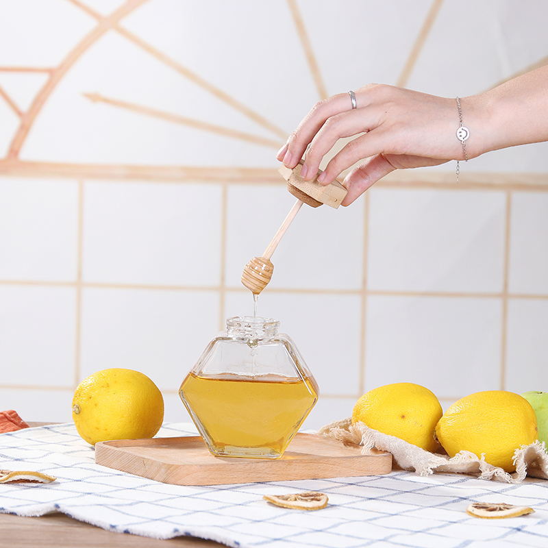 Wholesale Unique 220ml 380ml Frascos Para Miel Packaging Flat Hexagon Glass Jar For Honey