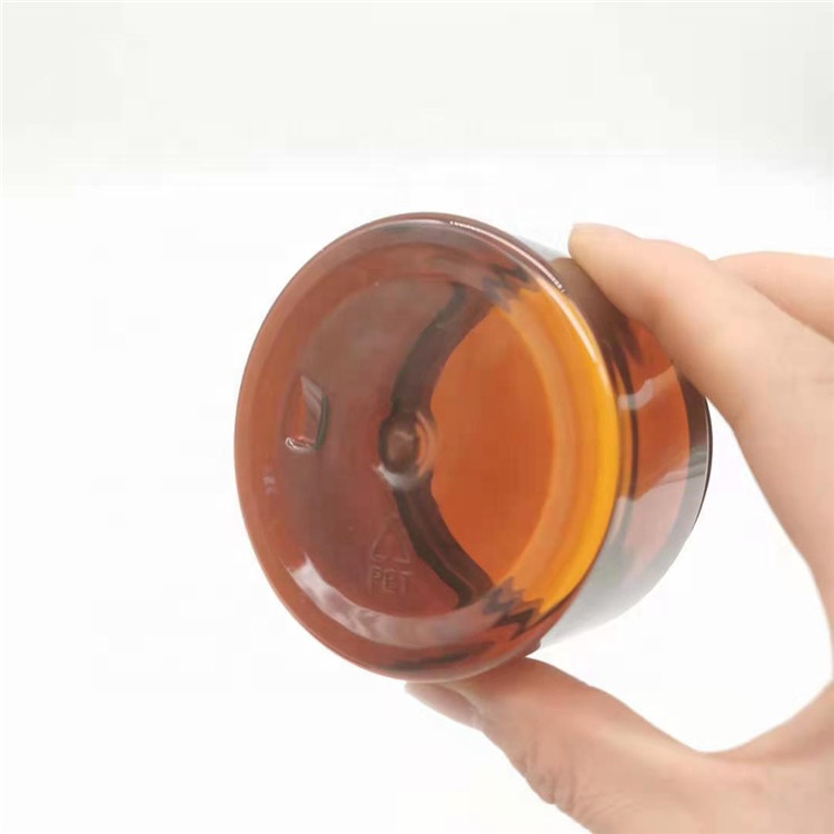 Wholesale Wide Mouth 1oz 2oz 3oz 4oz 5oz 6oz 8oz black PET plastic jars with lids for food storage, cosmetic packaging container