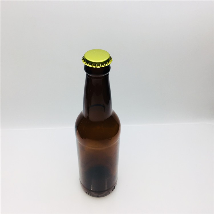 Wholesale amber brown glass beer bottle 330ml with crown cap