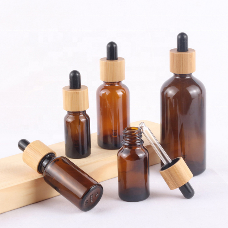 Wholesale amber glass bottles 10ml 15ml 20ml 30ml 50ml 100ml glass dropper bottles with bamboo cap