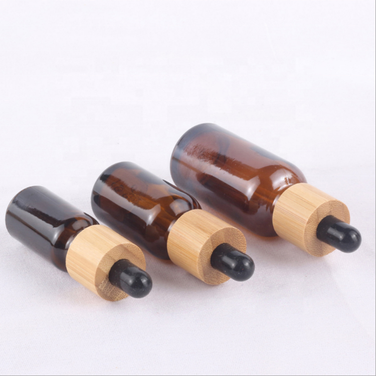 Wholesale amber glass bottles 10ml 15ml 20ml 30ml 50ml 100ml glass dropper bottles with bamboo cap