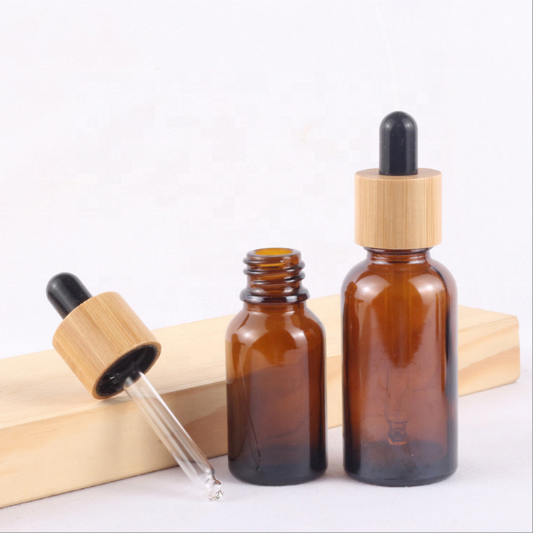 Wholesale amber glass bottles 10ml 15ml 20ml 30ml 50ml 100ml glass dropper bottles with bamboo cap