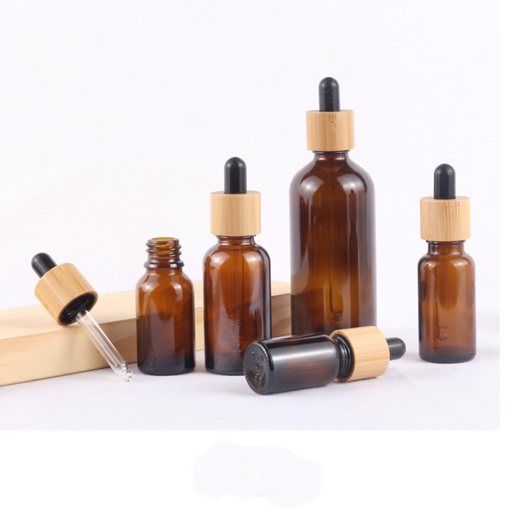 Wholesale amber glass bottles 10ml 15ml 20ml 30ml 50ml 100ml glass dropper bottles with bamboo cap
