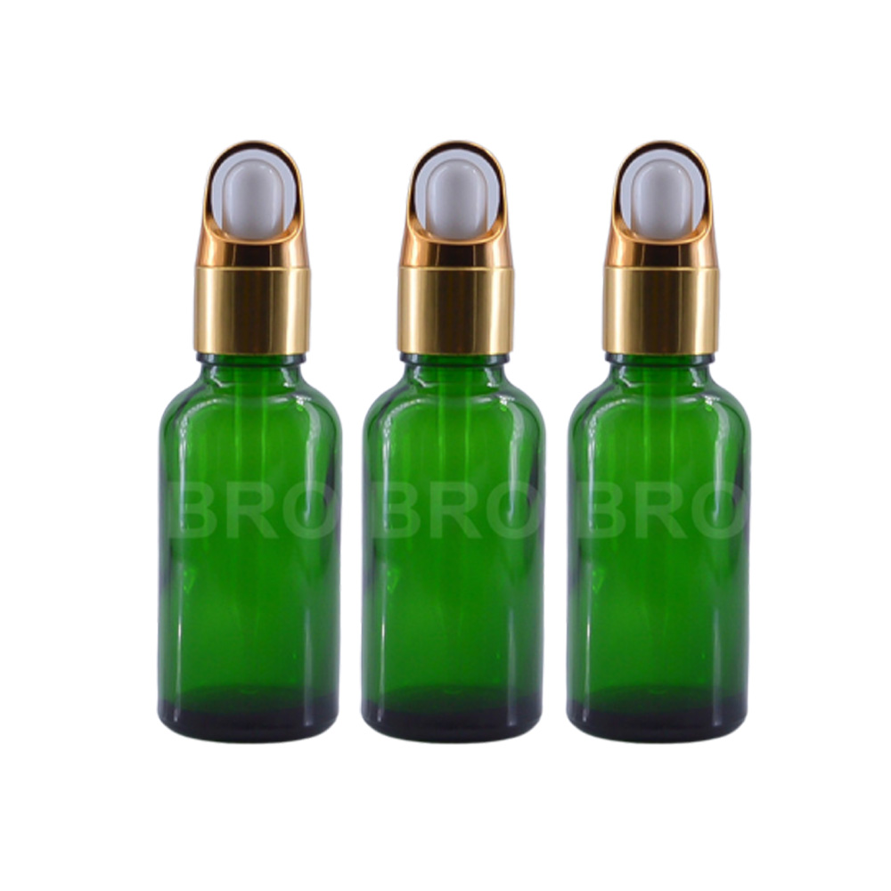 Wholesale best selling luxury gold aluminum dropper cap 30ml green glass essential oil bottle for serum oil