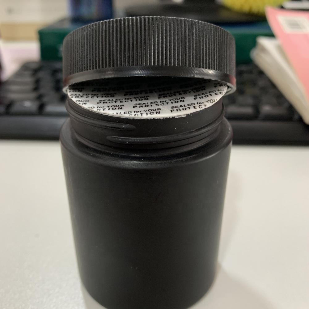 Wholesale black round glass storage jar with screw cap wholesale 100ml 150ml 200ml