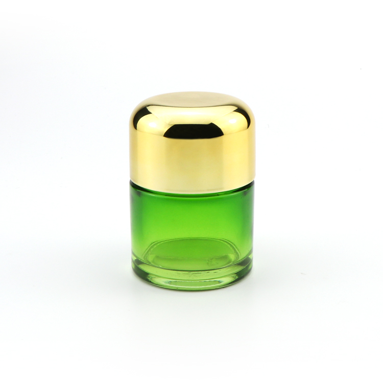 Wholesale bulk 5ml 50ml 70ml 110ml clear green glass herb storage jars with childproof gold cap
