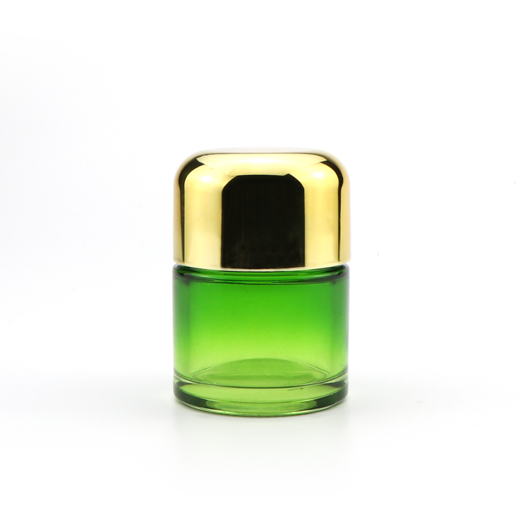 Wholesale bulk 5ml 50ml 70ml 110ml clear green glass herb storage jars with childproof gold cap