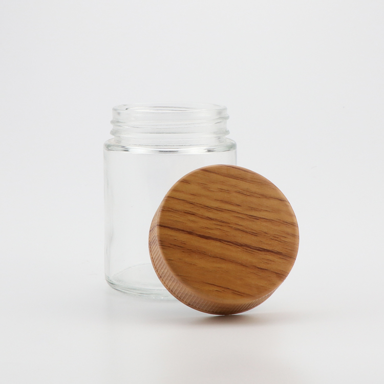 Wholesale canada 1oz 2oz 3oz 4oz CR flush cap clear empty air tight medical glass container jars with plastic wood lid