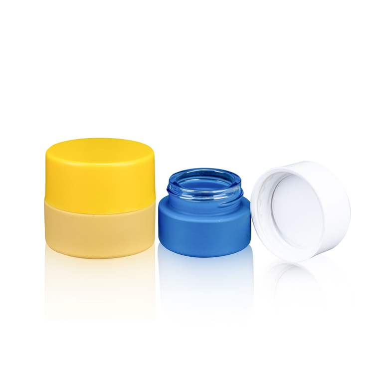 Wholesale child proof cap small wax oil jars gold uv glass concentrates edibles containers with child resistant lid
