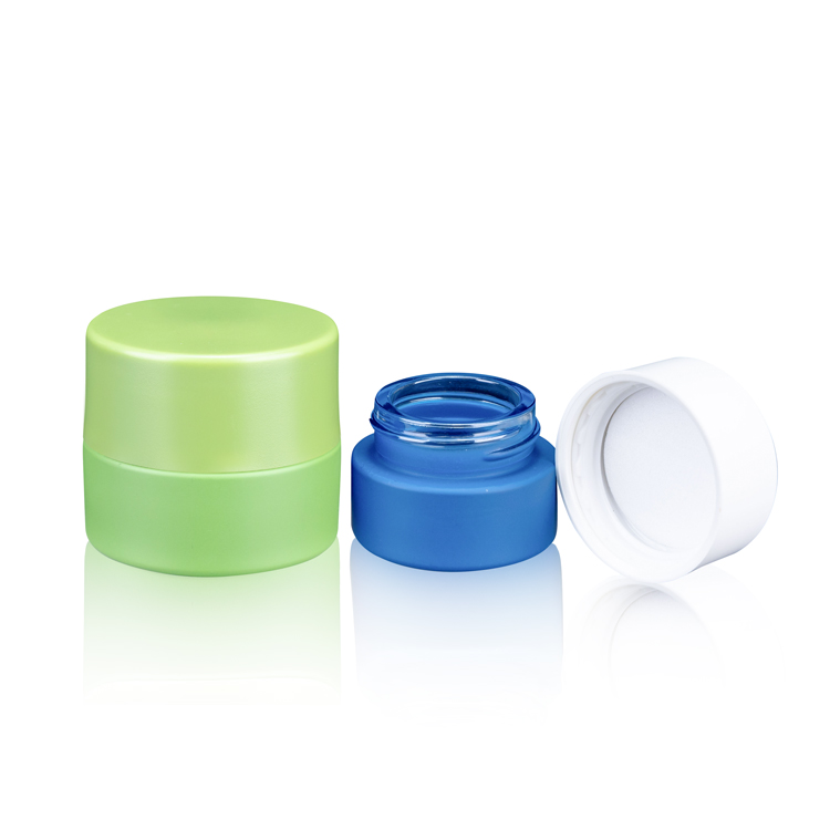 Wholesale child proof cap small wax oil jars gold uv glass concentrates edibles containers with child resistant lid