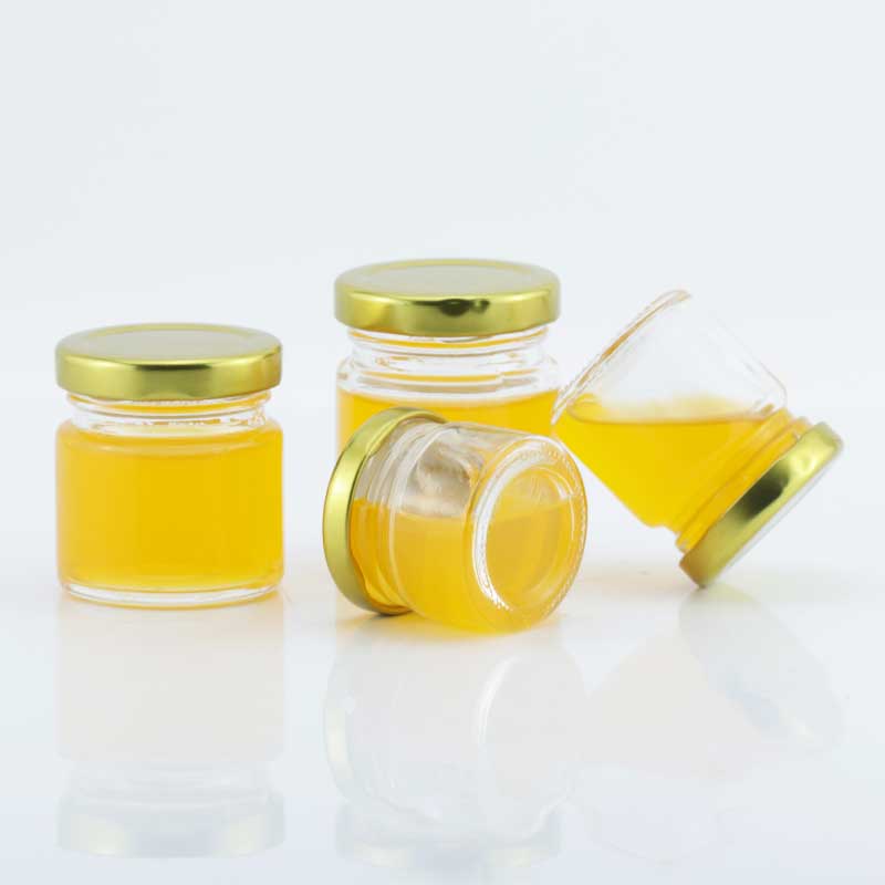 Wholesale classic 30ml 40ml 60ml 80ml mini clear round honey glass jar jam jar with metal top lid