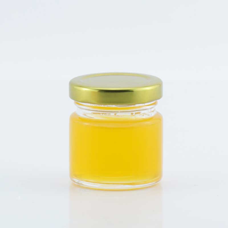 Wholesale classic 30ml 40ml 60ml 80ml mini clear round honey glass jar jam jar with metal top lid