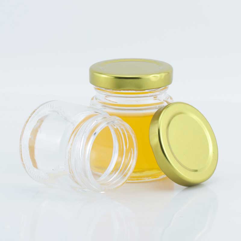 Wholesale classic 30ml 40ml 60ml 80ml mini clear round honey glass jar jam jar with metal top lid