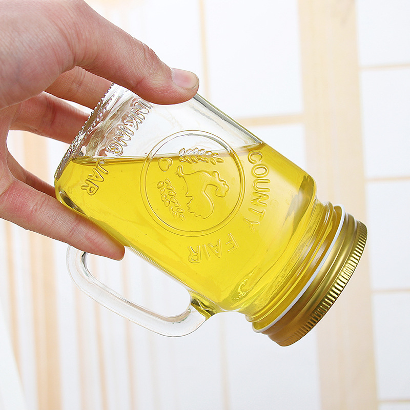 Wholesale clear 300ml 450ml 500ml 600ml glass mason jar drink glass candle glass with handle