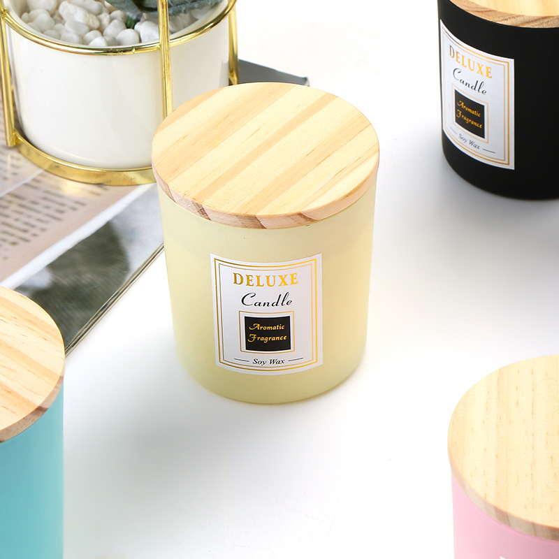 Wholesale clear and black frosted empty wide mouth container glass candle jars with wood lid in bulk