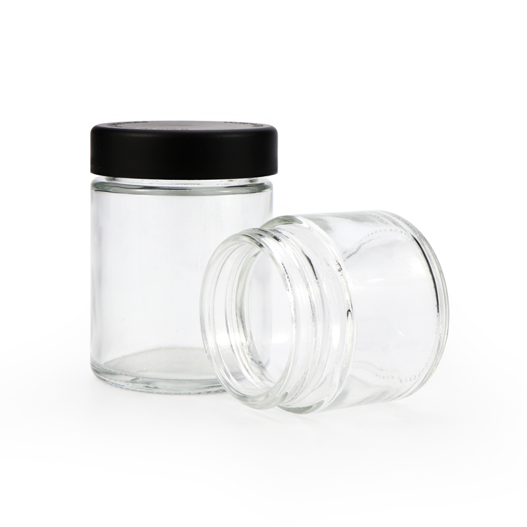 Wholesale clear black 3g 5g 7g 18g 60g Child Proof Cap Small Round Glass Weed Container 5ml Resistant Lid Jar For Hemp Packaging