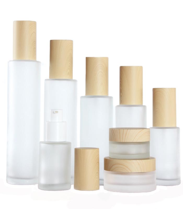 Wholesale cosmetic bottle glass jars skin care packaging set frost cream jars and spray lotion bottles with bamboo lid