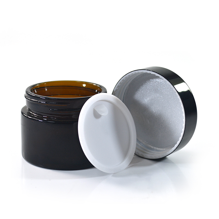 Wholesale cosmetic containers cream packaging 100g amber glass cream jars with black anodized aluminum lid