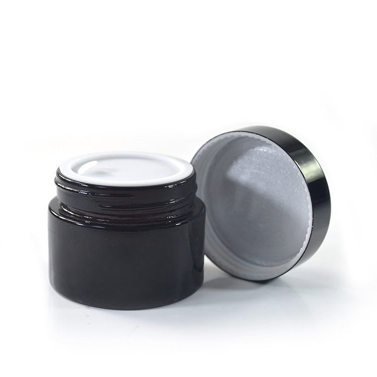 Wholesale cosmetic containers cream packaging 100g amber glass cream jars with black anodized aluminum lid