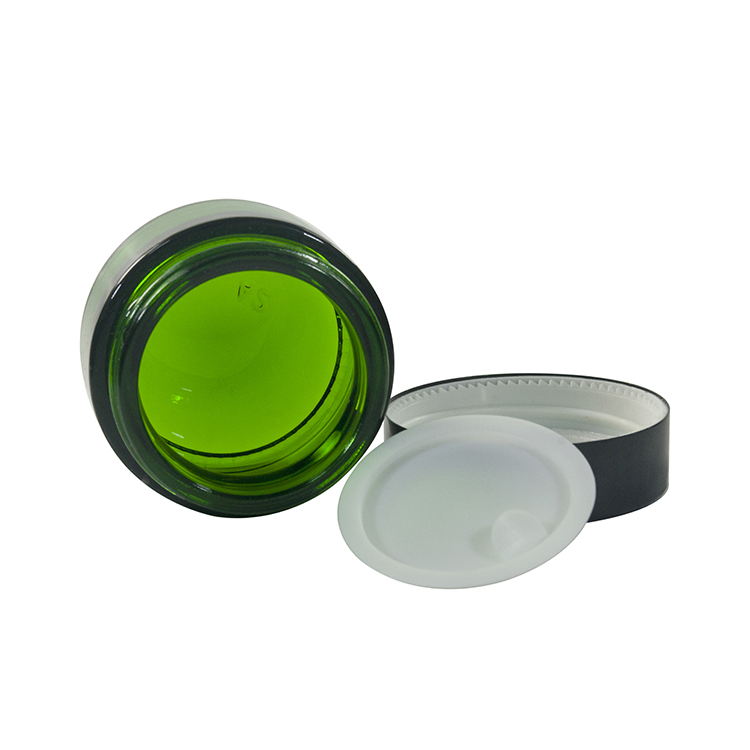 Wholesale cosmetic containers face cream packaging 20g 30g 50g green glass cream jar with black anodized aluminum lid