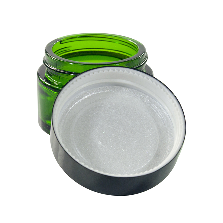 Wholesale cosmetic containers face cream packaging 20g 30g 50g green glass cream jar with black anodized aluminum lid