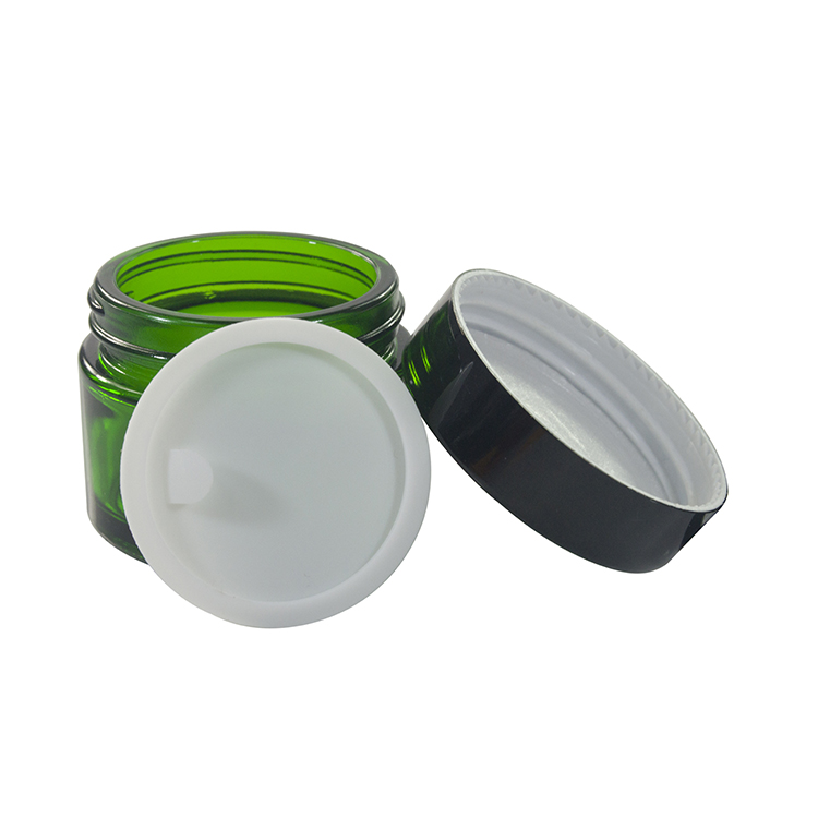 Wholesale cosmetic containers face cream packaging 20g 30g 50g green glass cream jar with black anodized aluminum lid