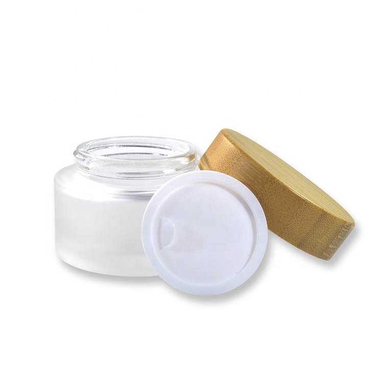 Wholesale cosmetic facial mask 1oz 5g 15g 30g 50g 100g frosted glass cream jar with bamboo wooden lid